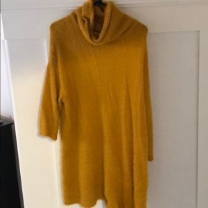 Oversized yellow turtle neck sweater